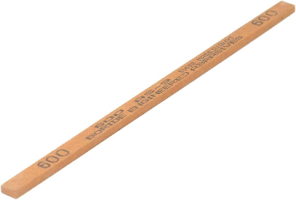 Pavo Monitor Arm installed on a wooden desk with cables organized